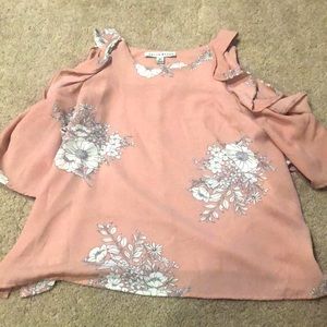 A Pink blouse with flowers and open shoulders